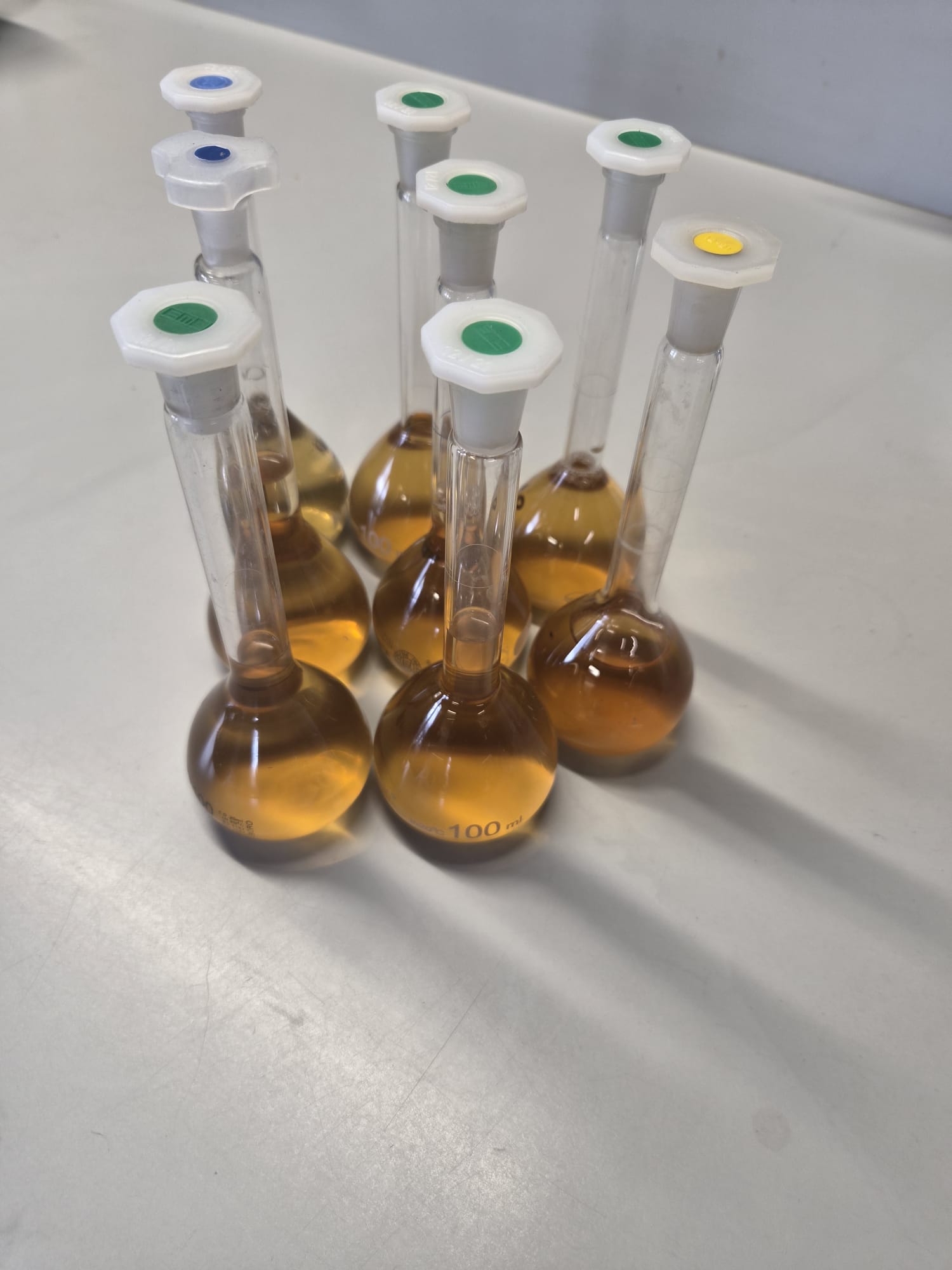 Analyst carrying out water analysis at the fume hood