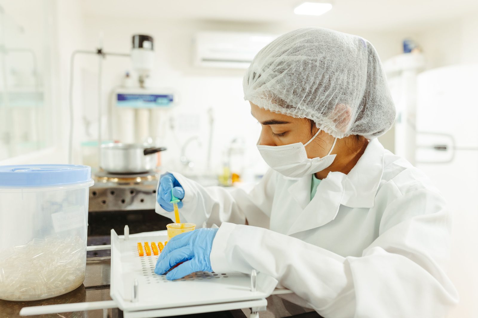 Analyst preparing a food sample for analysis